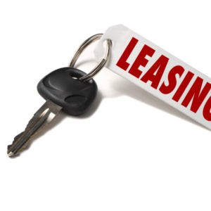 Car Key With Leasing Tag On White
